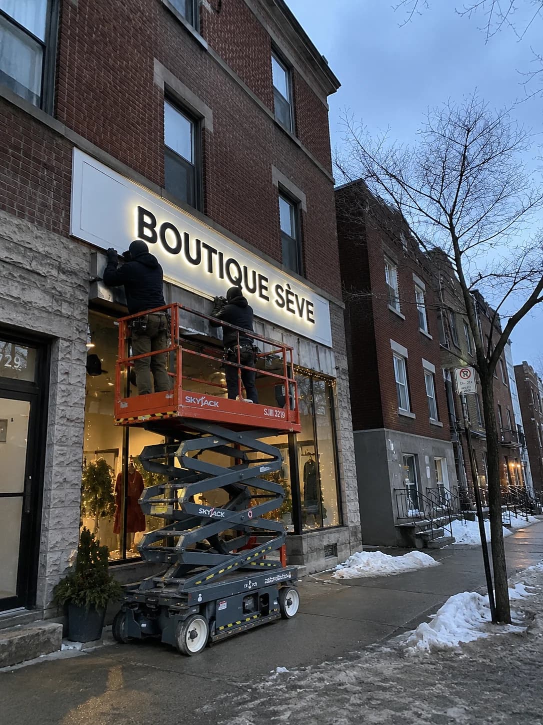 Pose de caisson rétroéclairé en hiver